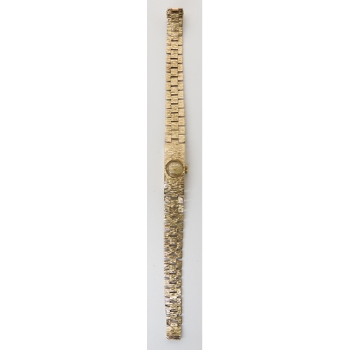 688 - A RETRO 9CT GOLD LADIES BUECHE GIROD WRISTWATCH