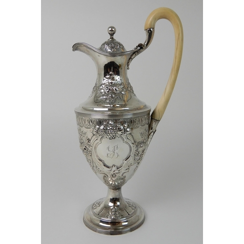 691 - A SILVER TROPHY EWER