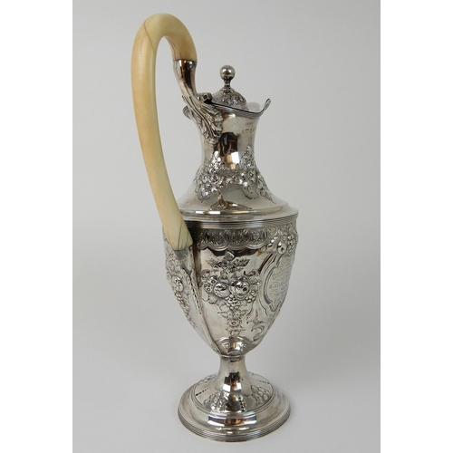 691 - A SILVER TROPHY EWER