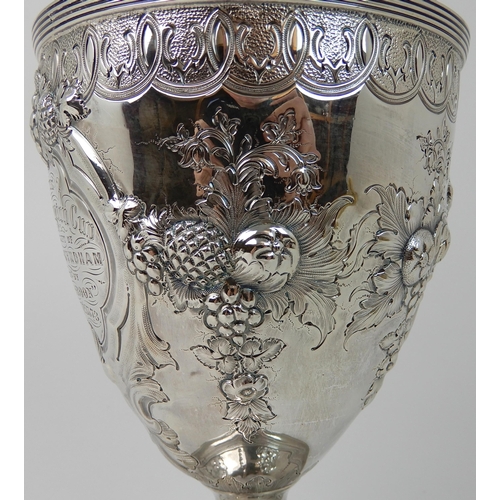 691 - A SILVER TROPHY EWER