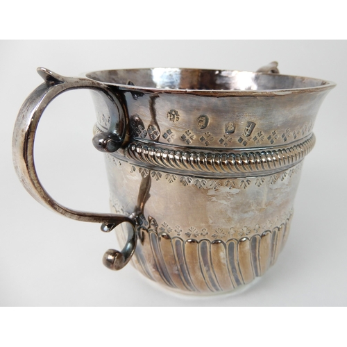 693 - AN EARLY 18TH CENTURY SILVER PORRINGER