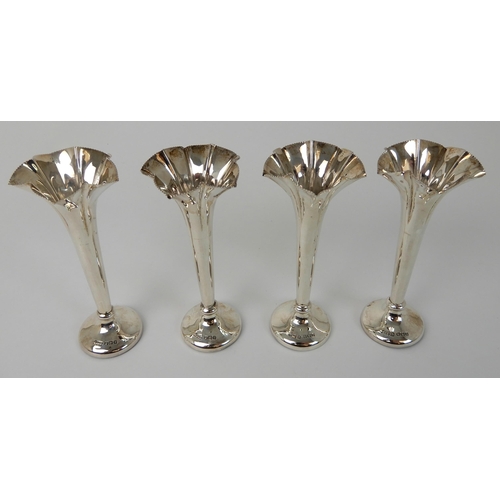 695 - A CASED SET OF FOUR SILVER FLOWER FLUTES