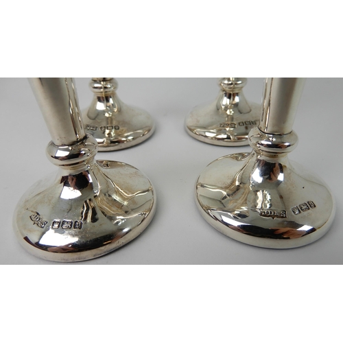 695 - A CASED SET OF FOUR SILVER FLOWER FLUTES