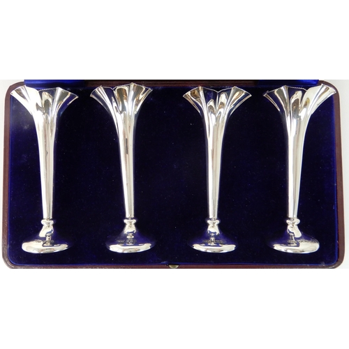 695 - A CASED SET OF FOUR SILVER FLOWER FLUTES