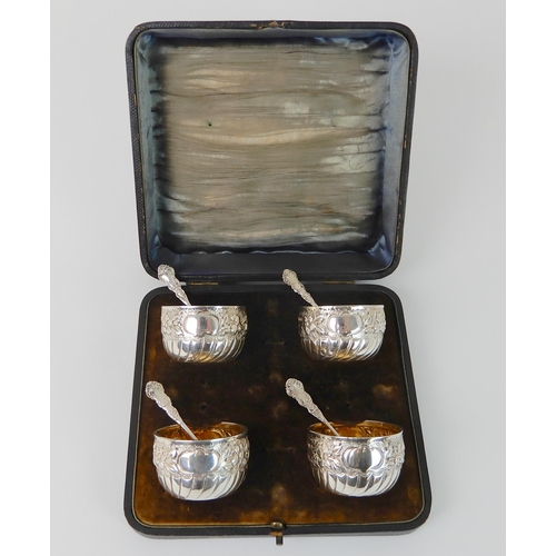 696 - A CASED SET OF FOUR SILVER SALTS