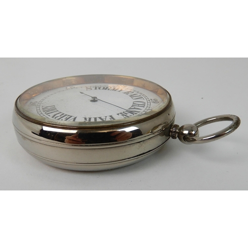 697 - A WHITE METAL CASED BAROMETER