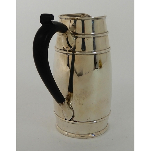 709 - A SILVER WATER JUG