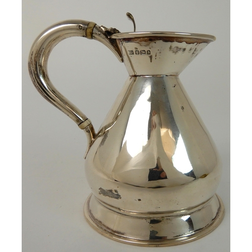 710 - A SILVER HOT WATER JUG