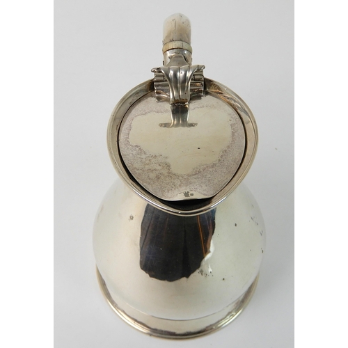 710 - A SILVER HOT WATER JUG