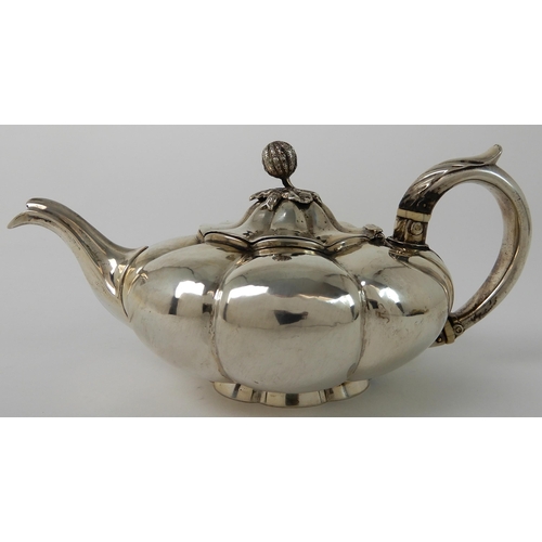 713 - A SILVER TEAPOT