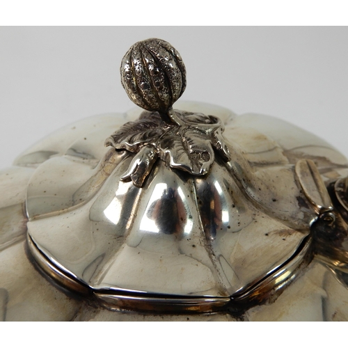 713 - A SILVER TEAPOT