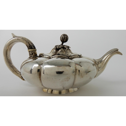 713 - A SILVER TEAPOT