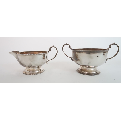 727 - A FOUR PIECE SILVER TEA SERVICE