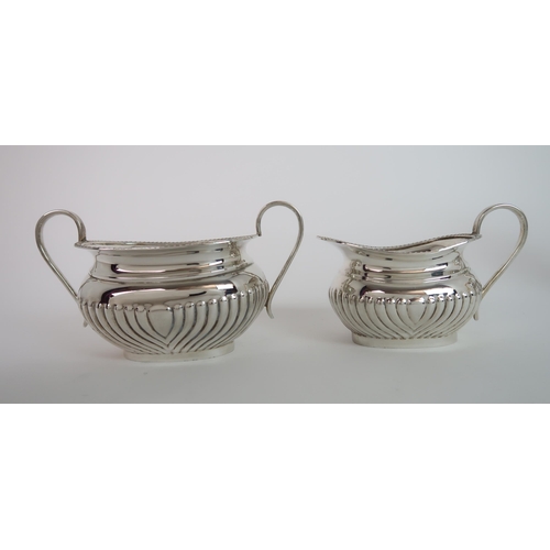 743 - A FOUR PIECE SILVER TEA SERVICE