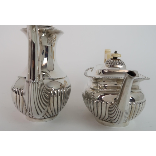 743 - A FOUR PIECE SILVER TEA SERVICE