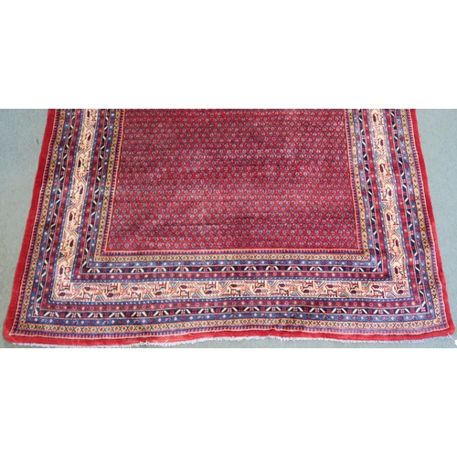 101 - A RED GROUND ARAAK RUG