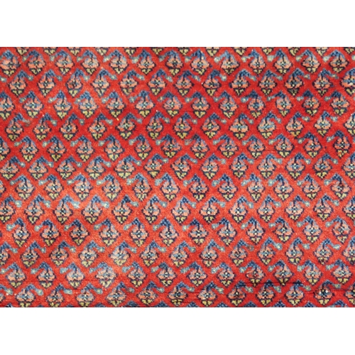 101 - A RED GROUND ARAAK RUG