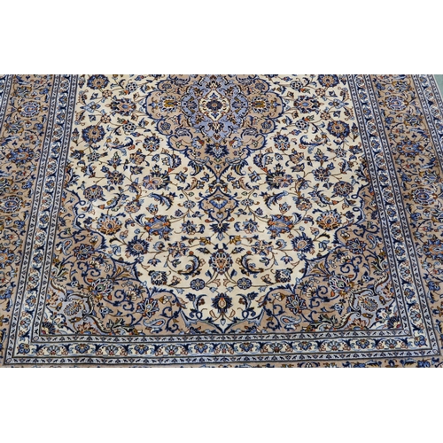 102 - A CREAM GROUND FINE KESHAN RUG