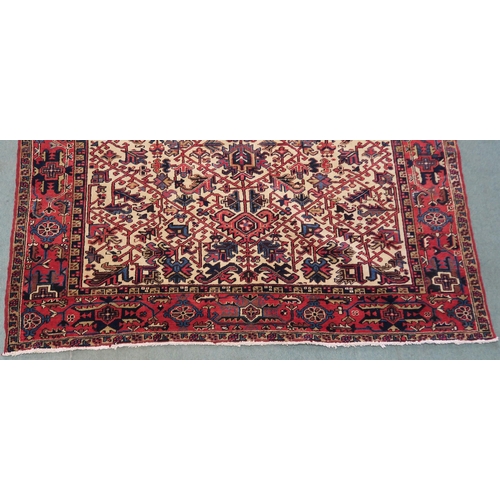 104 - A CREAM GROUND HERIZ RUG