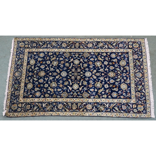 107 - A DARK BLUE GROUND FINE KARAJEH RUG