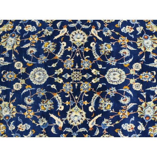 107 - A DARK BLUE GROUND FINE KARAJEH RUG