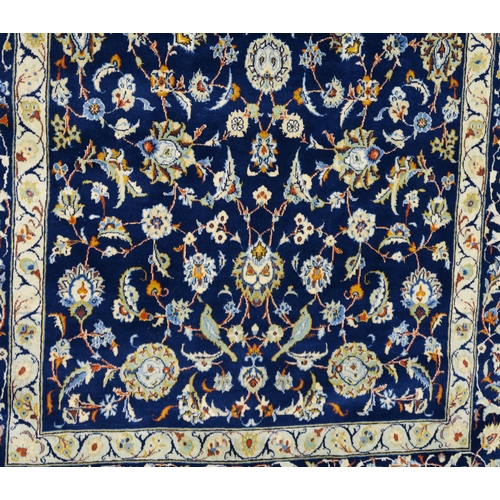 107 - A DARK BLUE GROUND FINE KARAJEH RUG