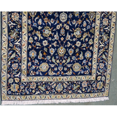 107 - A DARK BLUE GROUND FINE KARAJEH RUG