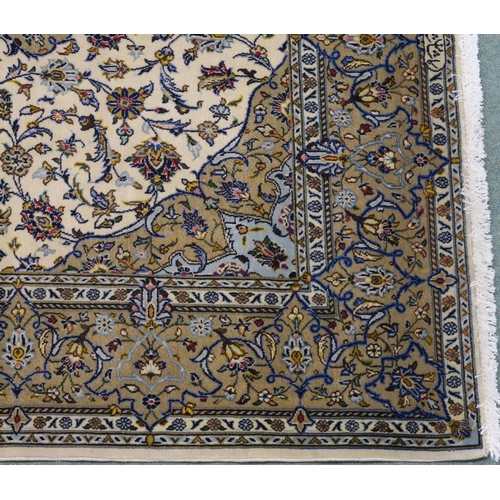 108 - A CREAM GROUND FINE KESHAN RUG.