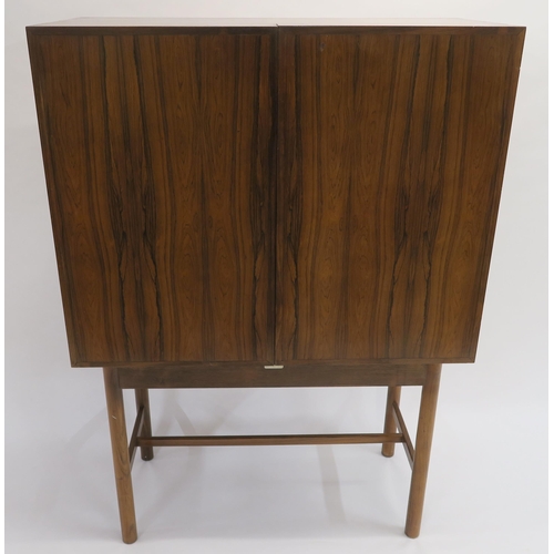 114 - A MID CENTURY ROSEWOOD COCKTAIL CABINET