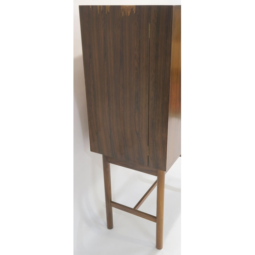 114 - A MID CENTURY ROSEWOOD COCKTAIL CABINET