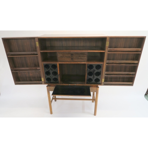 114 - A MID CENTURY ROSEWOOD COCKTAIL CABINET