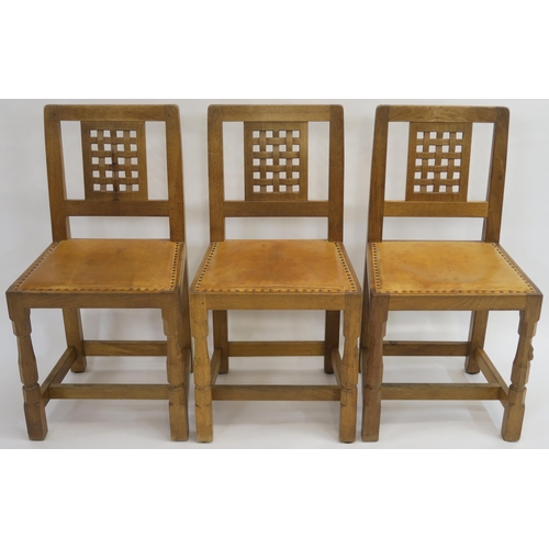132 - A ROBERT MOUSEMAN THOMPSON OF KILBURN DINING TABLE AND CHAIRS