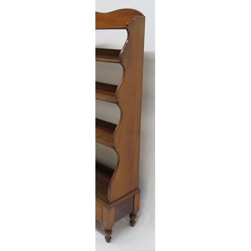 26 - A VICTORIAN MAHOGANY WATERFALL BOOKCASE