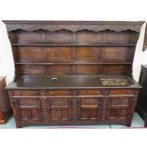 64 - A 20TH CENTURY OAK DRESSER