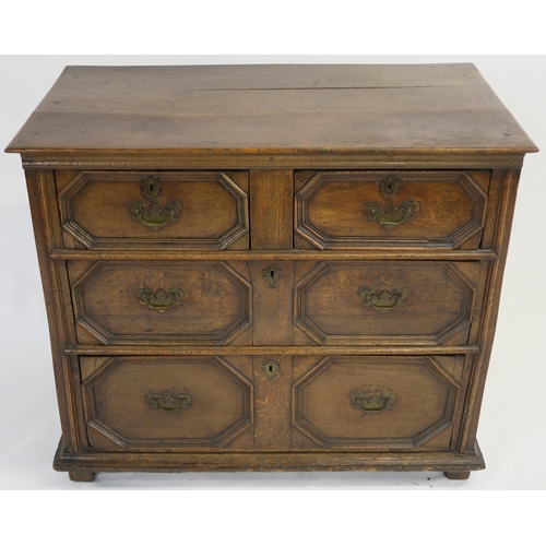 65 - A 17TH CENTURY STYLE OAK PANELLED CHEST