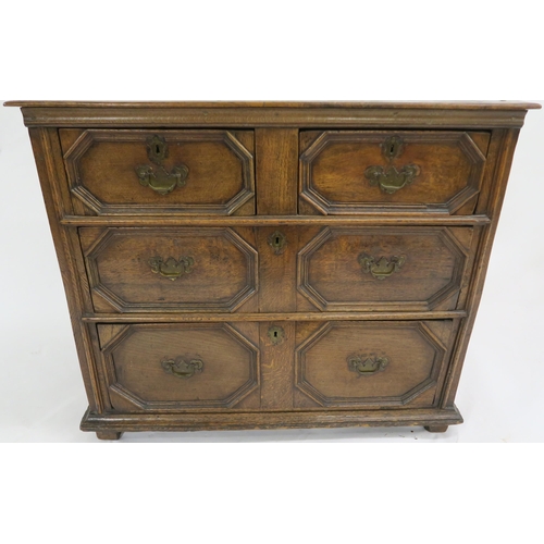 65 - A 17TH CENTURY STYLE OAK PANELLED CHEST