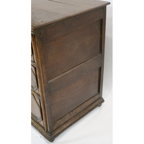 65 - A 17TH CENTURY STYLE OAK PANELLED CHEST