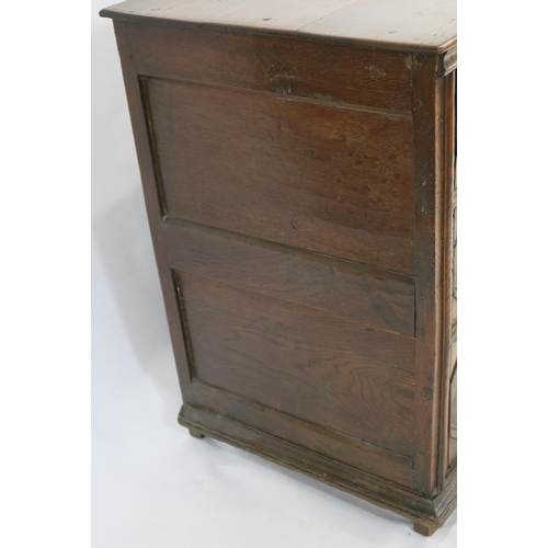 65 - A 17TH CENTURY STYLE OAK PANELLED CHEST