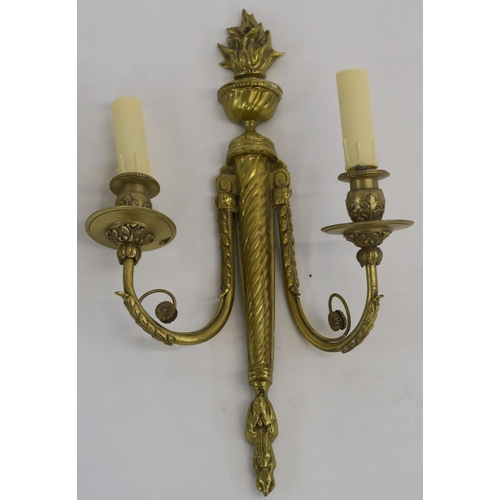 66 - A SET OF FOUR FRENCH GILT METAL WALL SCONCES WITH FLAME FINIALS