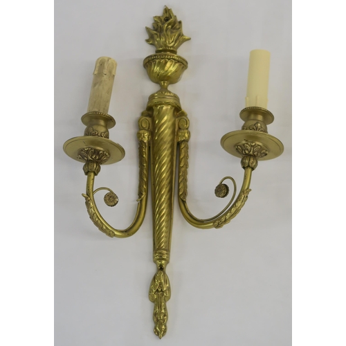 66 - A SET OF FOUR FRENCH GILT METAL WALL SCONCES WITH FLAME FINIALS