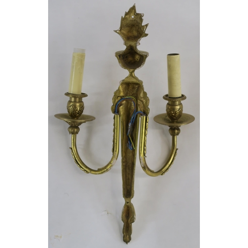 66 - A SET OF FOUR FRENCH GILT METAL WALL SCONCES WITH FLAME FINIALS