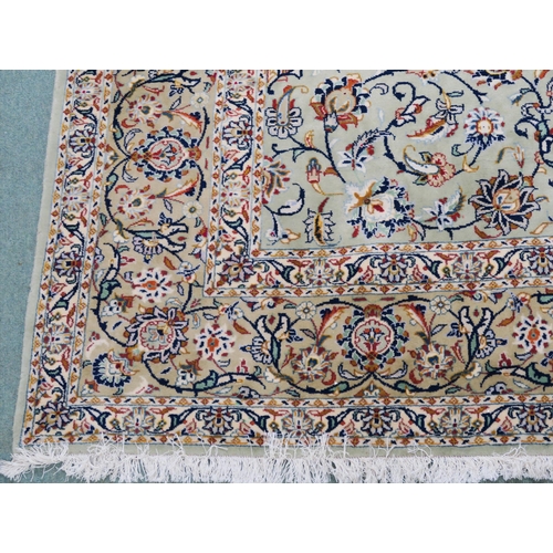 91 - A LIGHT GREEN GROUND KESHAN RUG