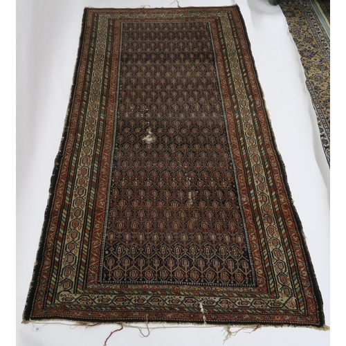 95 - A BLUE GROUND CAUCASIAN RUG