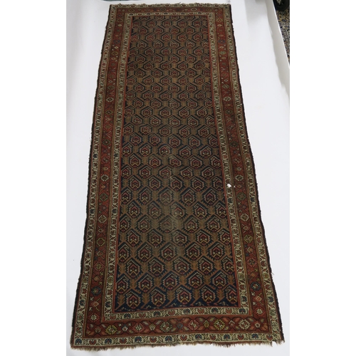 96 - A BLUE GROUND CAUCASIAN RUG