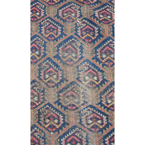 96 - A BLUE GROUND CAUCASIAN RUG