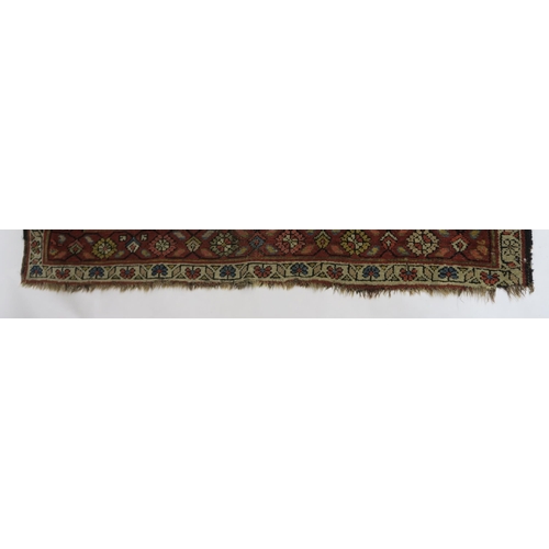 96 - A BLUE GROUND CAUCASIAN RUG