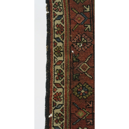 96 - A BLUE GROUND CAUCASIAN RUG