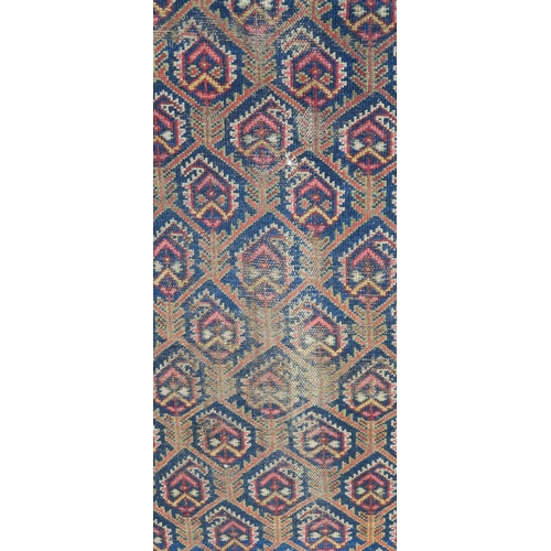 96 - A BLUE GROUND CAUCASIAN RUG