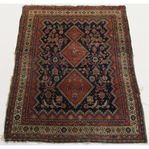 97 - A BLUE GROUND CAUCASIAN RUG