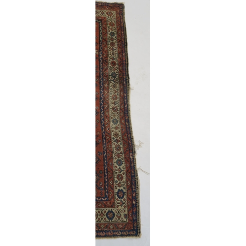 97 - A BLUE GROUND CAUCASIAN RUG